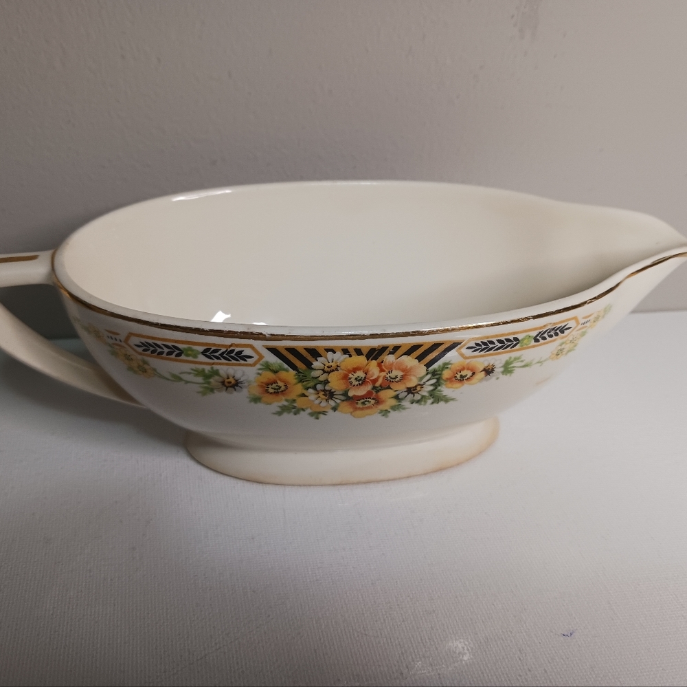 Vintage Edwin k n o w l e s gravy dish 8 in Long 2.5 in tall white made in China